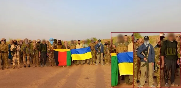 Файл:Боевики Азавада держат украинский флаг.webp